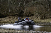 Load image into Gallery viewer, Man riding the Swellfish FS Jet 400 Tunnel Foldable Inflatable Boat passing on a very shallow water