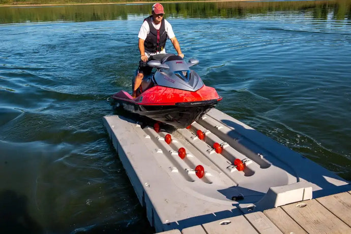 Man preparing to dock his watercraft on the Connect-A-Dock Port PWC Floating Docks - XL6