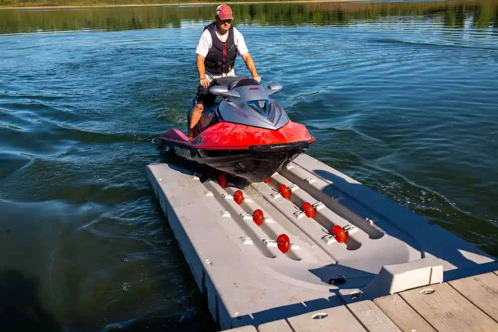 Man docking his watercraft into the Connect-A-Port PWC Floating Dock XL6