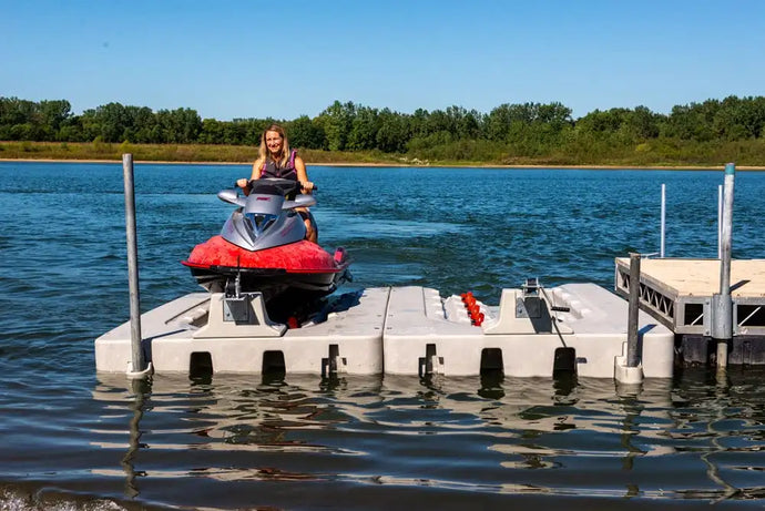 Woman docking her jet ski into the Connect-A-Port PWC Floating Dock XL5 