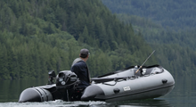 Load image into Gallery viewer, Man ready to go fishing with the Swellfish Classic 430 Inflatable Boat  (14'1")