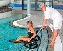 Load image into Gallery viewer, Hippocampe Swimming Pool Wheelchair, Man assisting a Woman