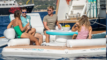 Load image into Gallery viewer, 4 people relaxing on the YachtBeach Pavilion Platform 4.10