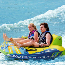 Load image into Gallery viewer, Rave Escape Pontoon 2P Towable Tube being towed with 2 people riding on it