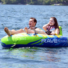 Load image into Gallery viewer, Rave Escape Pontoon 2P Towable Tube being towed with 2 people riding on it