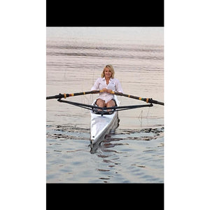Boat - Woman rowing with the Little River Marine Regata Rowing Shell on calm water