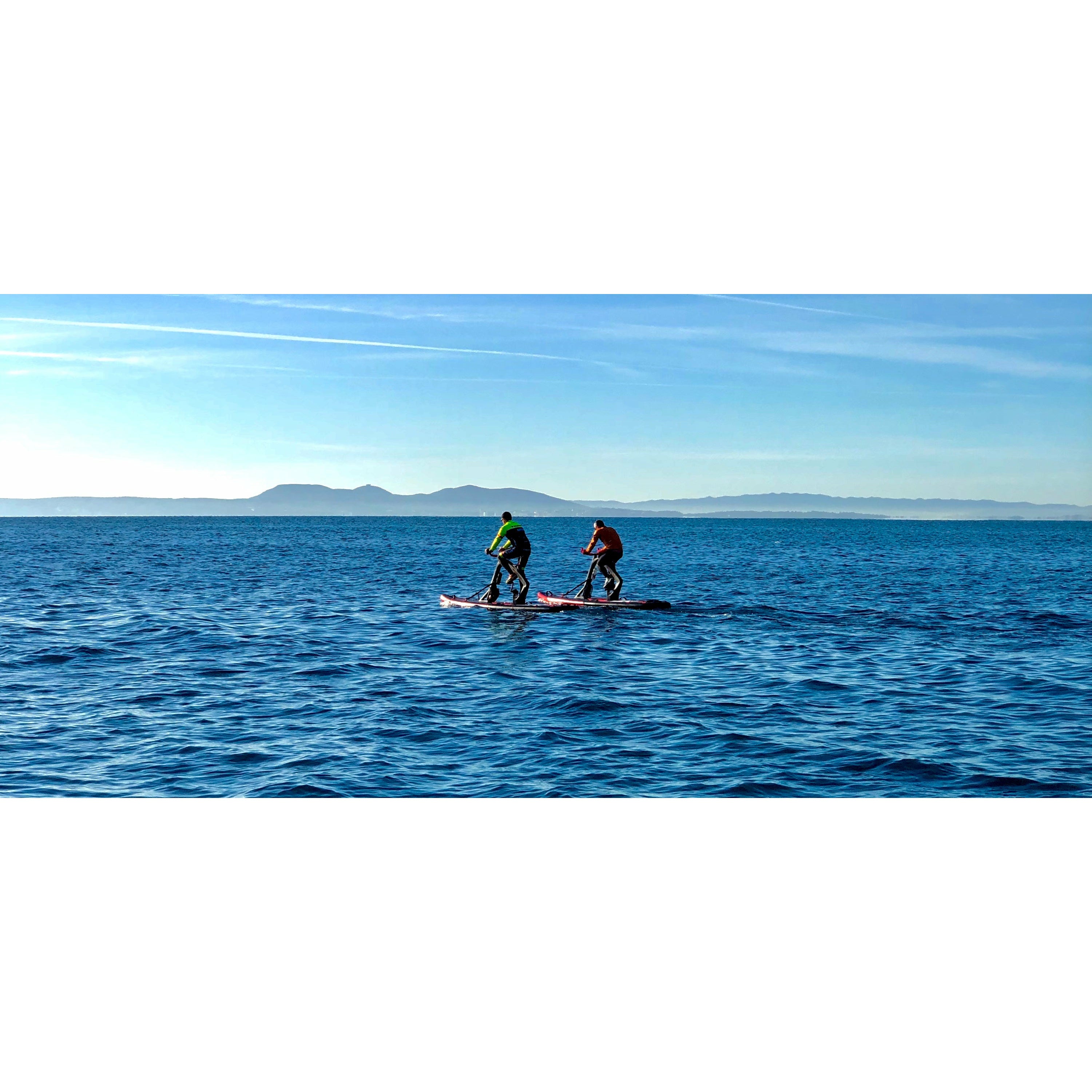 Red Shark Bike Surf Fitness Water Bike With 2 People Riding On It