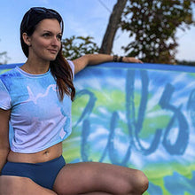 Load image into Gallery viewer, a girl seating while holding Pulse The Logie Dayz 11' Rectech Board