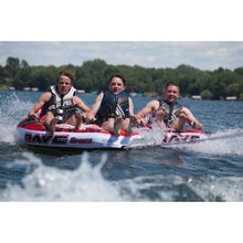 Load image into Gallery viewer, Front view of 3 mean riding in Rave Sports Warrior III - 3 Rider Towable 02379