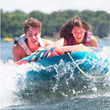 Load image into Gallery viewer, Man and woman riding in Rave Sports Prism Ultimate Trick Tube 02824