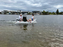 Load image into Gallery viewer, Three people riding the Scout Inflatables 245 Scout