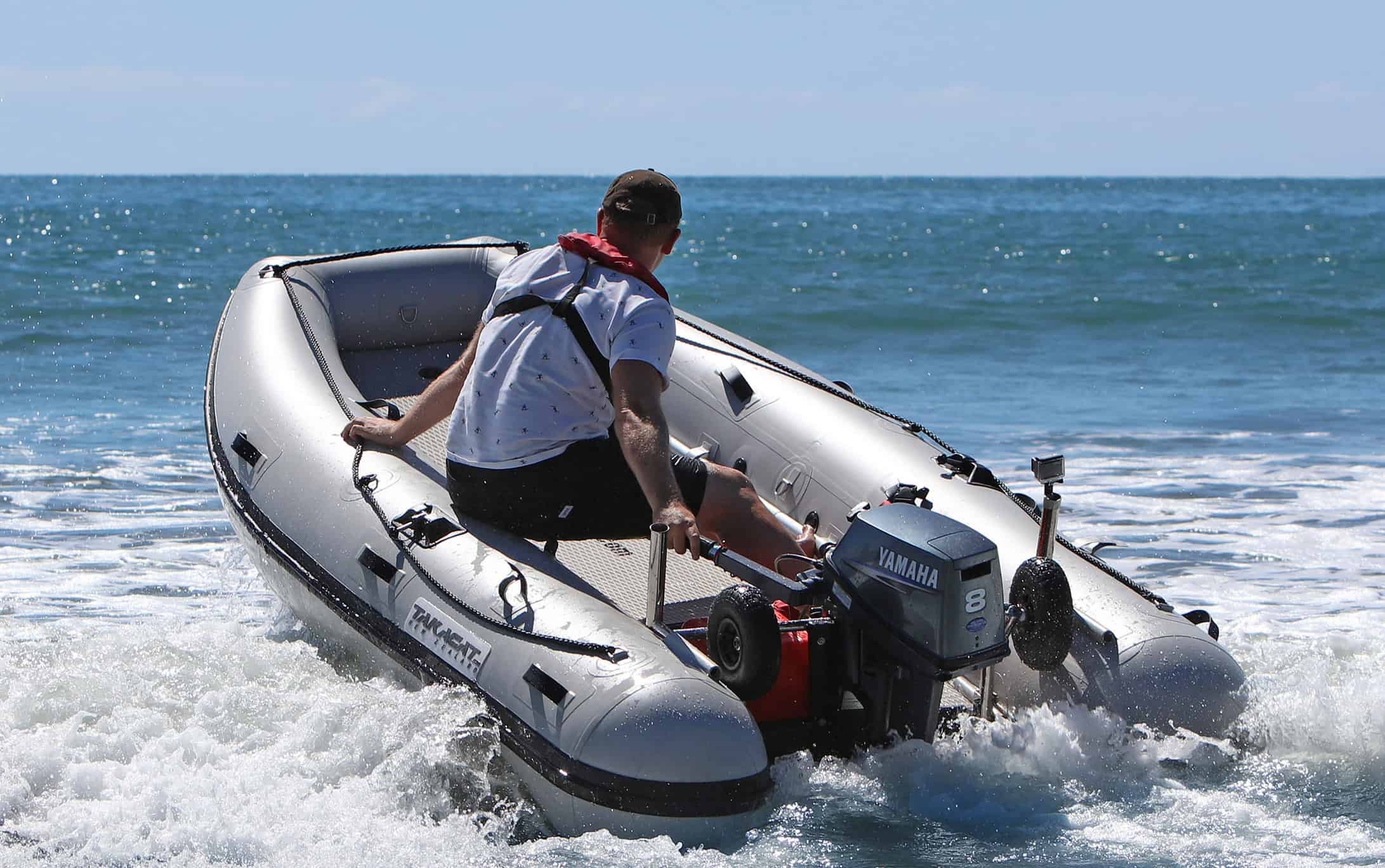 Man on board the Takacat T380S Inflatable Boat