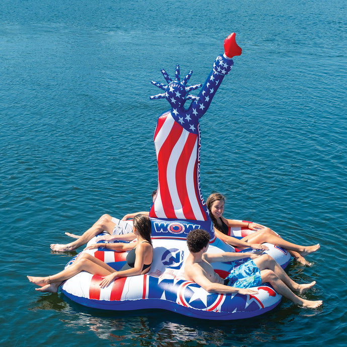 WOW Liberty Island Inflatable Platform floating in the water with 4 people sitting on it