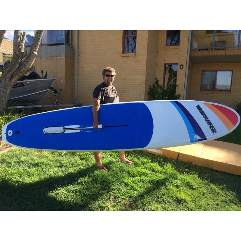 Windsurf Board - Man carrying the Aerotech Sails 2021 Windsurfer LT Windsurf Board