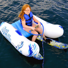 Load image into Gallery viewer, A kid riding in Rave Aqua Buddy while getting ready to ski with Rave Steady Eddy Trainer Water Ski'