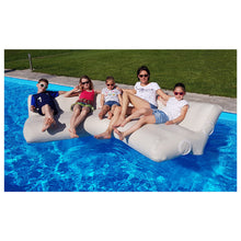 Load image into Gallery viewer, People sitting on the YachtBeach Air Sofa 5'x5'x2' in the pool