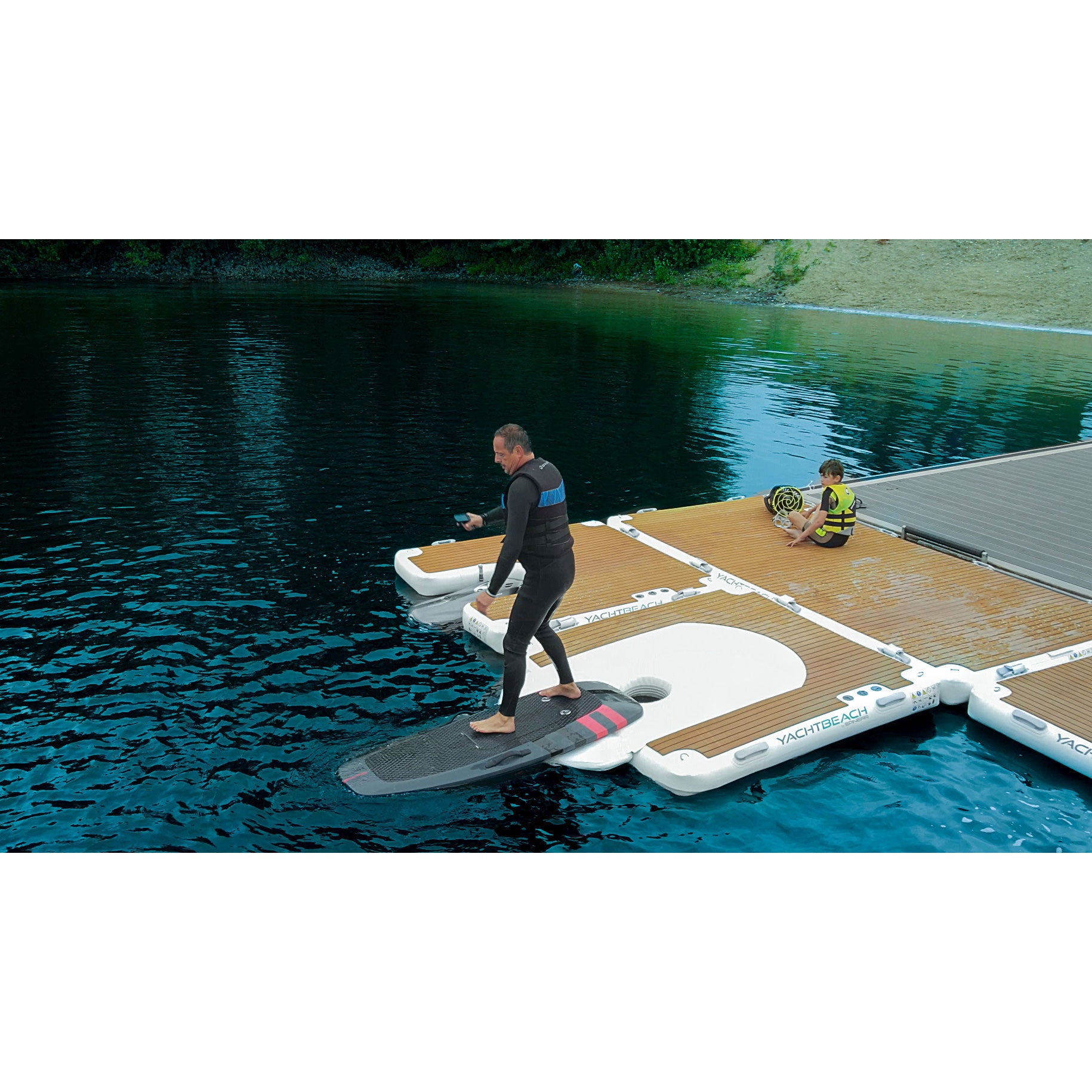 Man launching his foil from the YachtBeach Foil Dock Single 2.05
