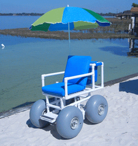 AccessRec PVC Beach Wheelchair With An Umbrella On The Beach
