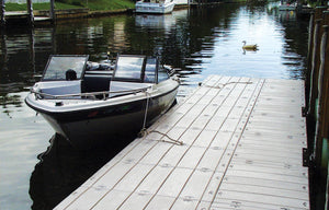 Connect-A-Dock Straight Shape High-Profile Docks with boat at the side