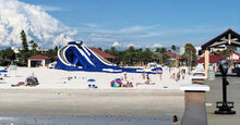 Load image into Gallery viewer, Freestyle Slides Trippo Inflatable Water Slide set up near the beach