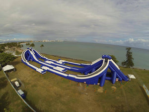 Double Freestyle Slides Trippo Inflatable Water Slide set up near the beach