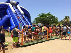 People falling in line to the Freestyle Slides Trippo Inflatable Water Slide