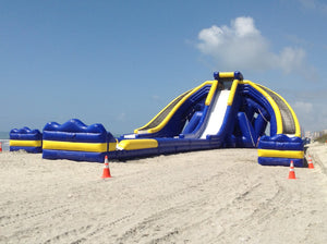 Freestyle Slides Trippo Inflatable Water Slide set up at the beach