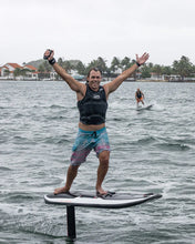 Load image into Gallery viewer, Man on board the Awake Vinga 3 Electric Surfboard EFoil