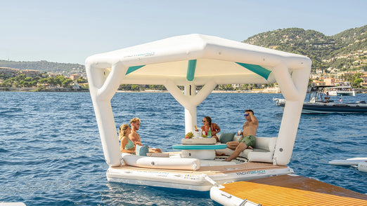 three people on the Yachtbeach Pavilion Beachclub Setup