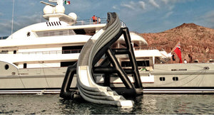 Freestyle Slides Cruiser Curved Slide set up at the side of the yacht