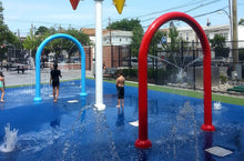 Load image into Gallery viewer, Children Playing On A Splashpad With Rain Drop Prodcts Super Soaker Water Features