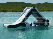 Load image into Gallery viewer, people having fun on the lake with the Freestyle Slides Cruiser XS Inflatable Yacht Slide