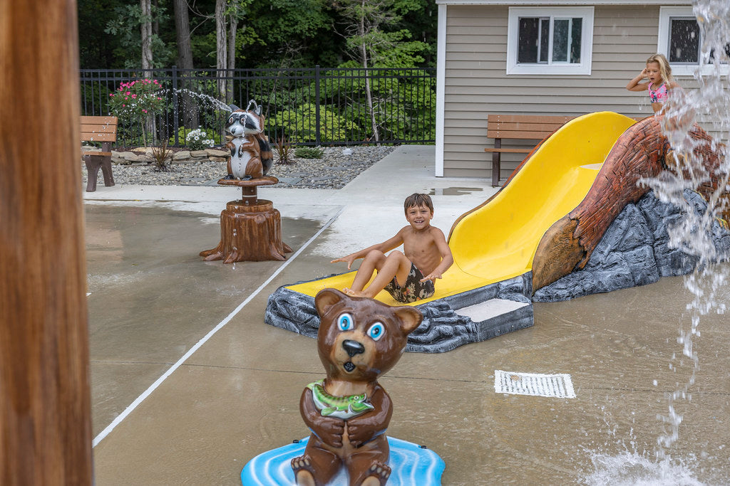 Children Sliding down Rain Drop Products Trunk Slide Water Feature