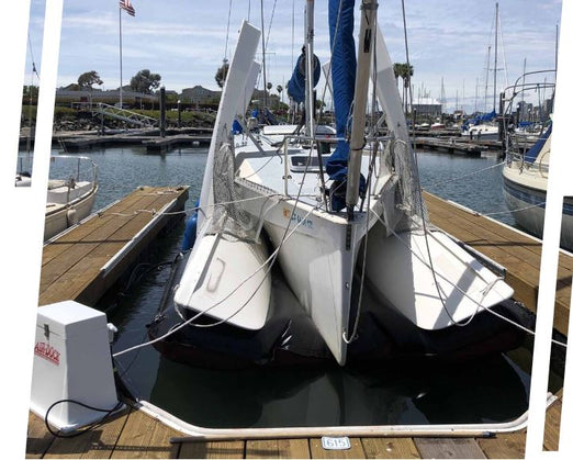Tri-Maran Sail Boat on an Air-Dock Inflatable Boat Lift