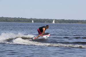 Man enjoying the water with the SAVA All-New E1-B Electric Surfboard