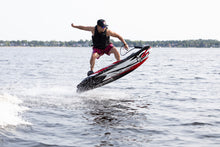 Load image into Gallery viewer, Man riding the SAVA All-New E1-B Electric Surfboard