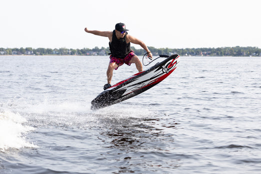 Man riding the SAVA All-New E1-B Electric Surfboard