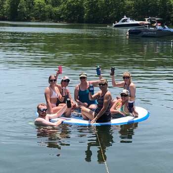 Paradise Pad 8' Round Splash Island Lake Pad with 7 adults on board