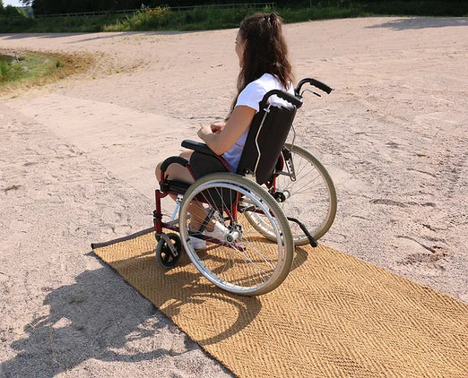 Lady In A Wheelchair on a AccessRec Cocopath Mat 