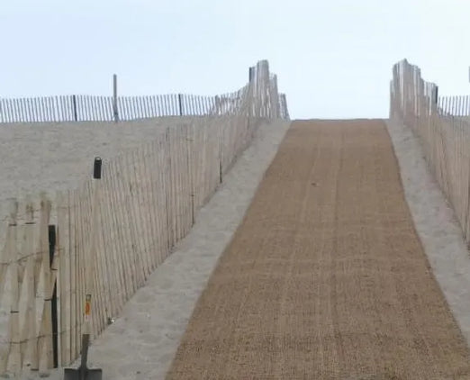 6.5' AccessRec Cocopath Mat being Utilized To Make A Walkway Across The Sand
