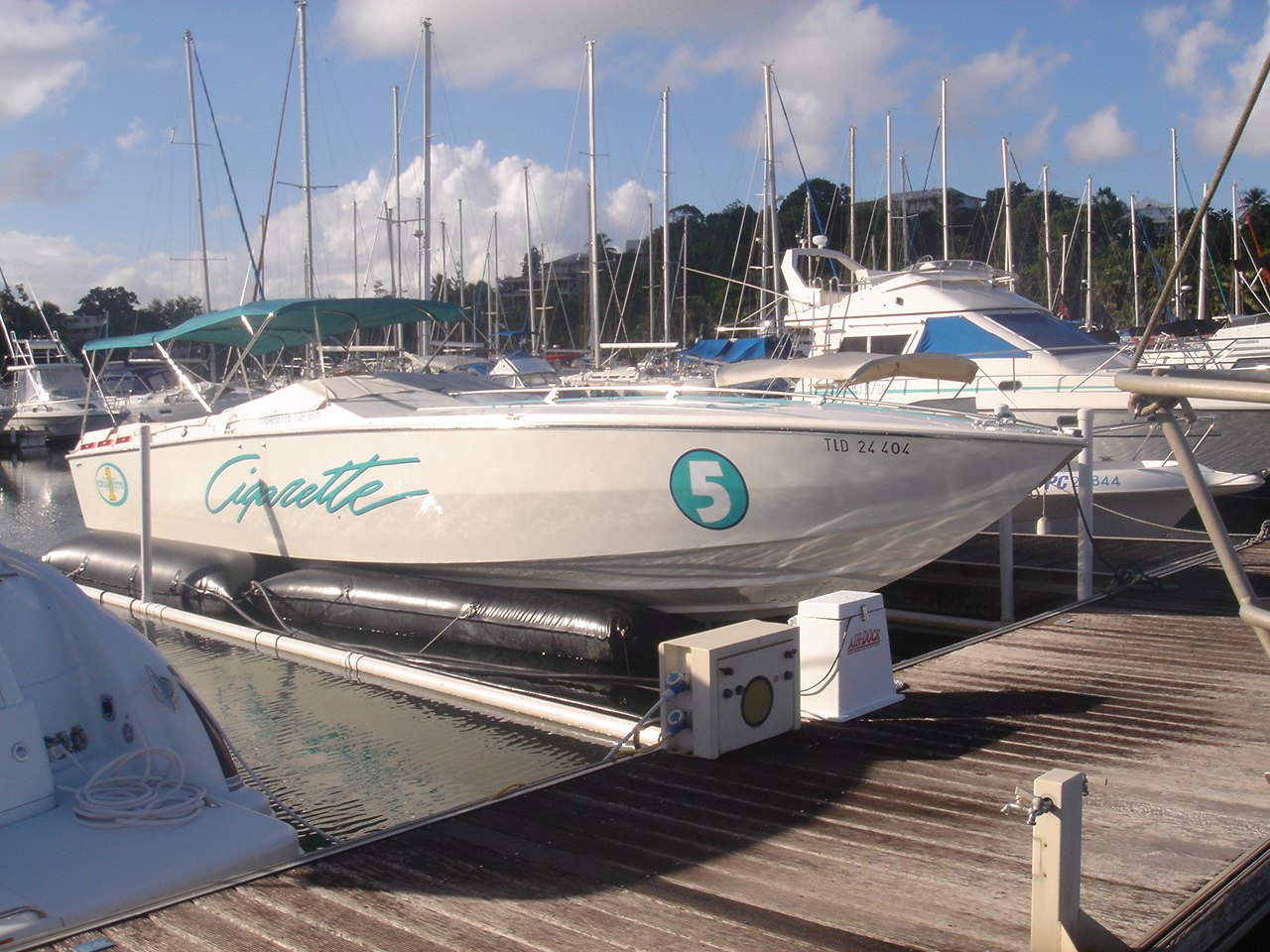 Cigarette Boat on an Airdock Boat Lift  With A Super Frame Kit