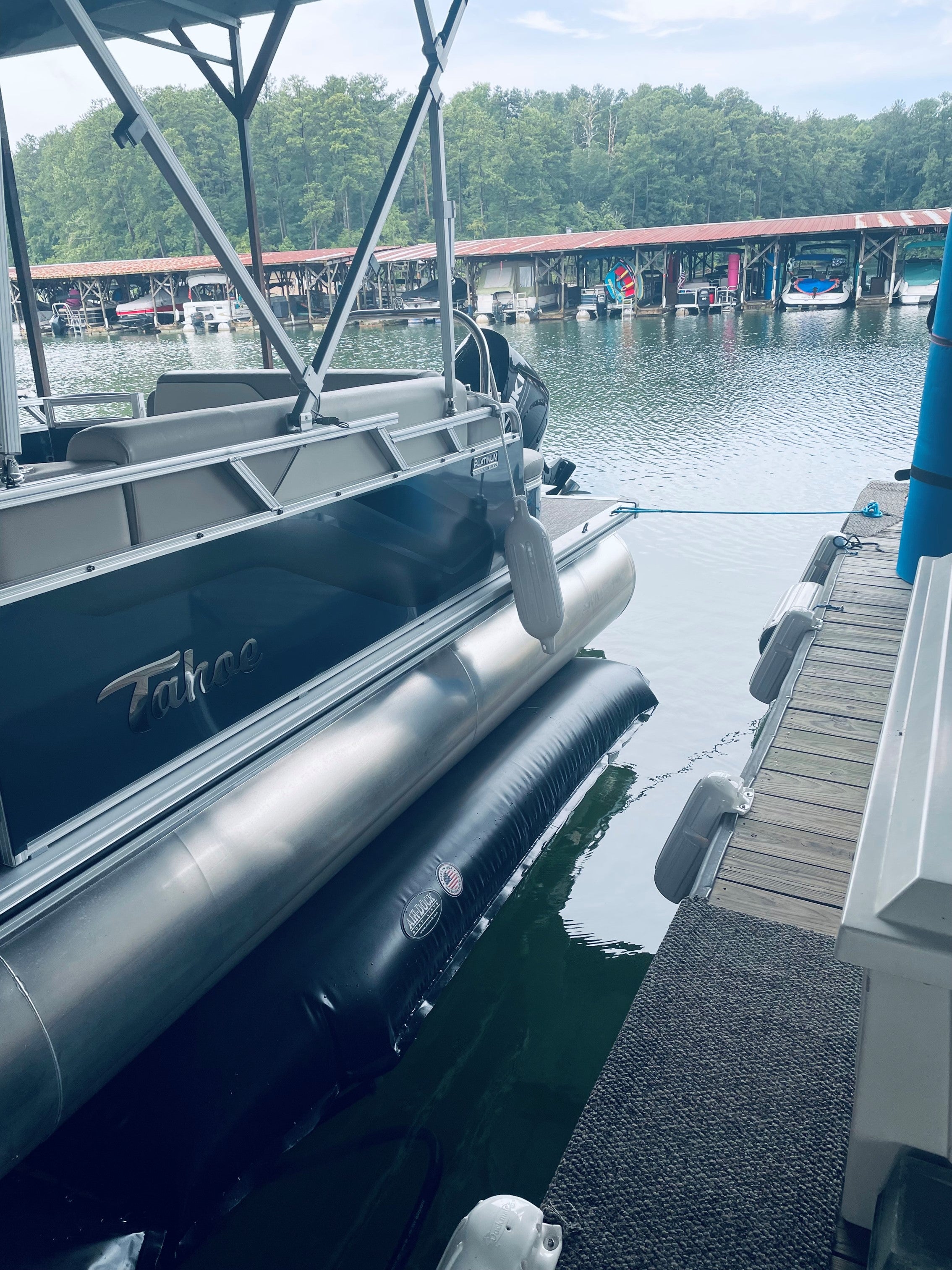 Tahoe Pontoon sitting on an Airdock