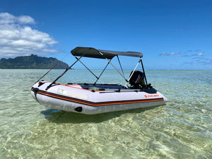 Kolibri KM-330D (10'10") Inflatable Boat on the water with bimini top
