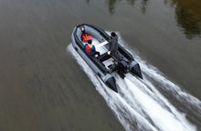 Load image into Gallery viewer, Man cruising the river with the Swellfish FS Jet 400 Tunnel Foldable Inflatable Boat