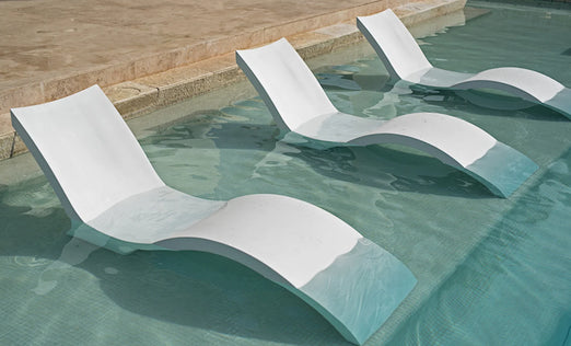 Ledge Signature Chaise Deep In-Pool Loungers and Table Set