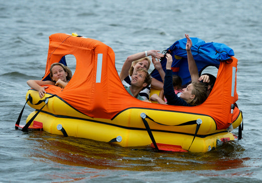 people on board the Switlik OPR Offshore Passage Raft waiting for rescue