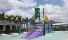 Load image into Gallery viewer, Spectrum Aquatics SlideWorx Kiddie Slide installed in a kiddie swimming pool
