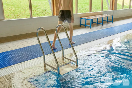 Plastex Floorline Marine Mat blue beside a pool