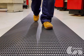 Plastex Heronair Workplace Mat in a walkway of workplace