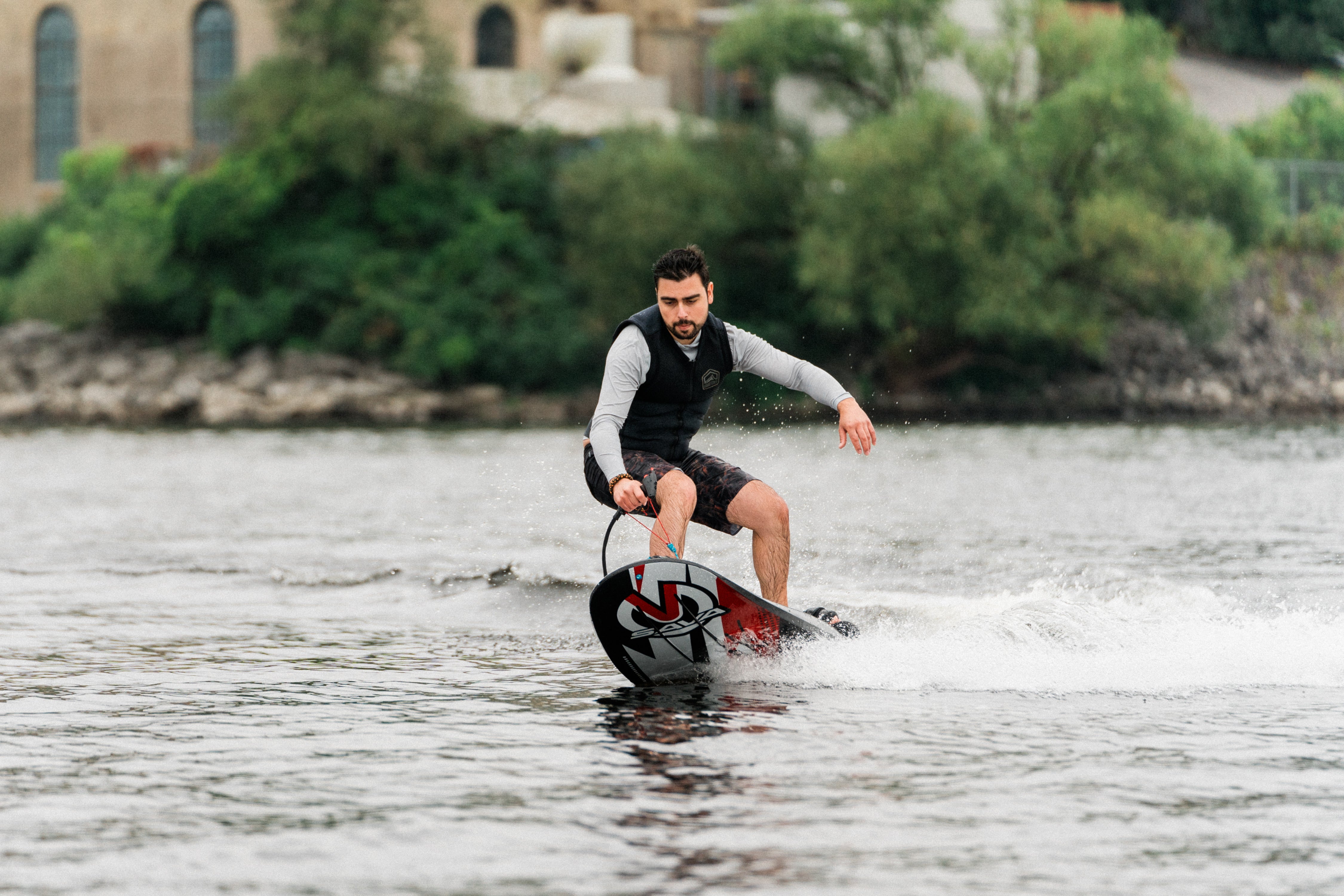 Man enjoying the ride on SAVA All-New E1-B Electric Surfboard